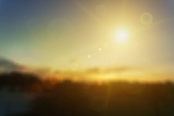 istock Relaxing outdoors vacation landscape concept: Abstract blurred sunlight beach colorful blurred bokeh background with retro effect autumn sunset sky have blue bright, white, and color orange calm. 1391401875