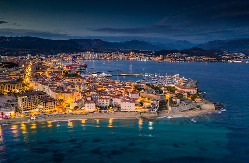 Aerial view of the illuminated cityscape of Ajaccio in Corsica. Corse-du-Sud, in France