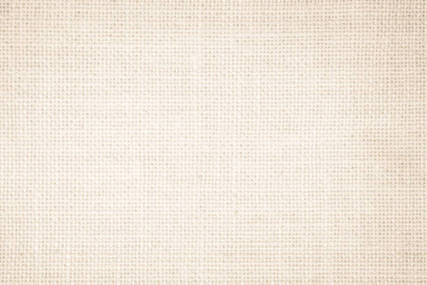 istock Jute hessian sackcloth burlap canvas woven texture background pattern in light beige cream brown color blank. Natural weaving fiber linen and cotton cloth texture as clean empty for decoration. 1391402743