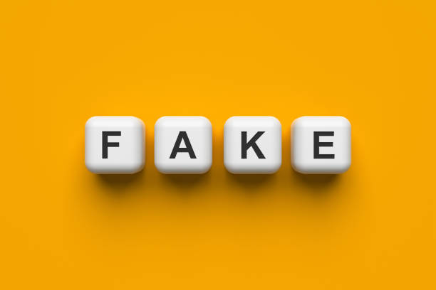 istock Fake. White cubes on a yellow background. 1391405044