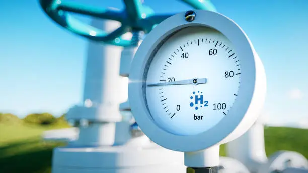 Photo of Close up of a manometer with a hydrogen pipe in the background. 3d rendering.