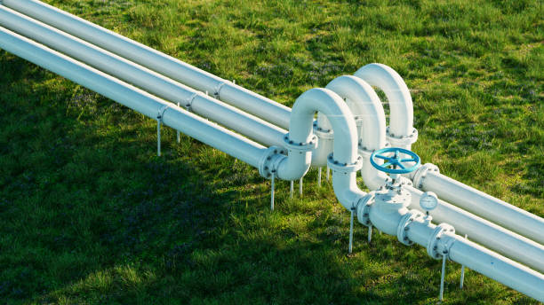 white gas and oil pipeline on lush grassy background. 3d rendering. - liquid natural gas imagens e fotografias de stock