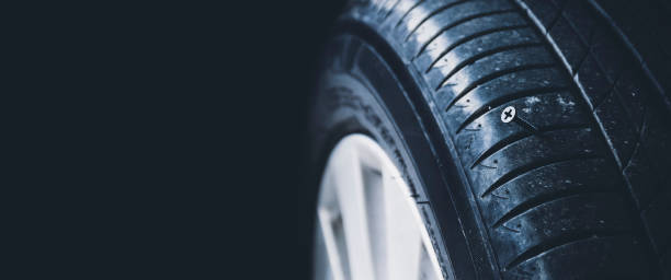istock A close-up shows a sharp metal screw piercing an automobile tire 1391409823
