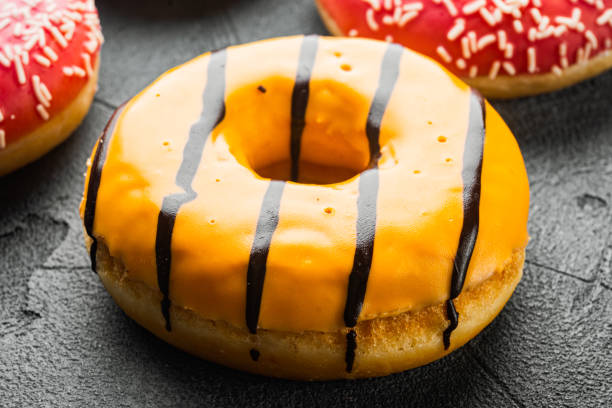 istock Orange fresh Donut, on gray background 1391409838