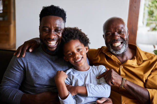 istock Man and his senior dad and young son laughing together 1391410165