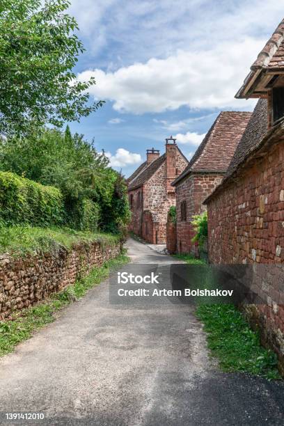 Street With Perfectly Preserved Medieval Residential Masonry Buildings On Outskirts Of Collongeslarouge Correze Department New Aquitaine Region France Stock Photo - Download Image Now