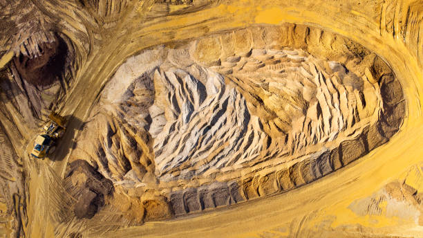 istock Gravel and sand open pit mining, sand hills - aerial view 1391413343