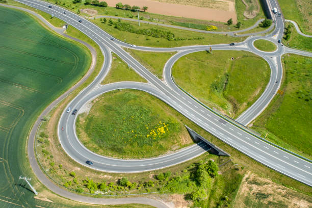 istock Road junction and traffic circle - aerial view 1391413359
