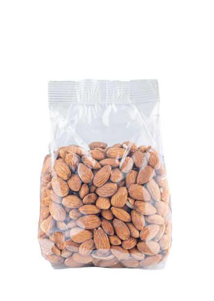istock almond in a transparent package on a white isolated background 1391416308