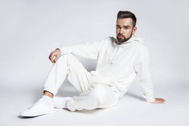 istock Handsome man wearing blank white hoodie and pants 1391417301