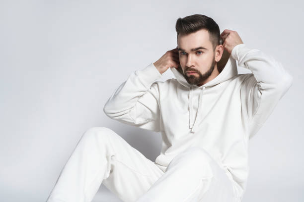 istock Handsome man wearing blank white hoodie and pants 1391417339