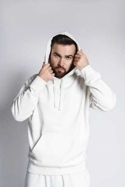 istock Handsome man wearing blank white hoodie and pants 1391417347
