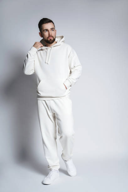 istock Handsome man wearing blank white hoodie and pants 1391417377