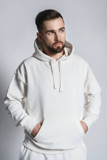istock Handsome man wearing blank white hoodie and pants 1391417976