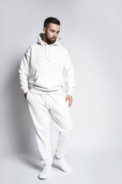 istock Handsome man wearing blank white hoodie and pants 1391418156
