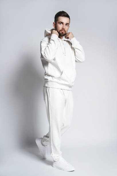 istock Handsome man wearing blank white hoodie and pants 1391418204