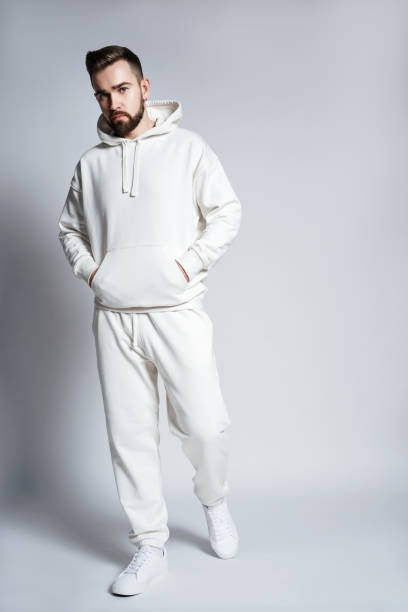 istock Handsome man wearing blank white hoodie and pants 1391418270