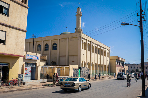 Asmara, Eritrea - November 02, 2019:  Beige Local Building near the Central street of Asmara