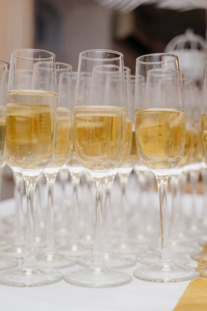 istock Glasses of champagne on a blur background 1391436820