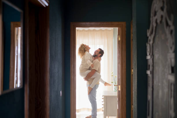 istock Man Picking Up Wife At Home 1391437505