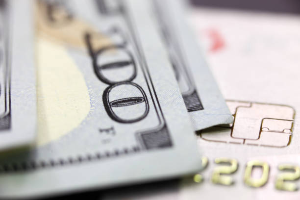 istock Bank card and American dollars 1391438762