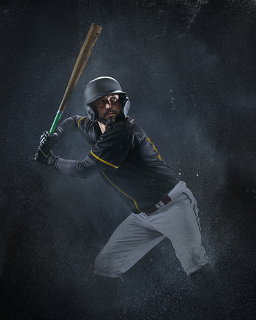 Baseball, bat and swing of a woman outdoor on a pitch for sports, performance and competition. Professional athlete or softball player with focus, space and ready for game, training or exercise