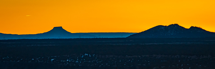 golden sky after sunset on a New Mexico horizon