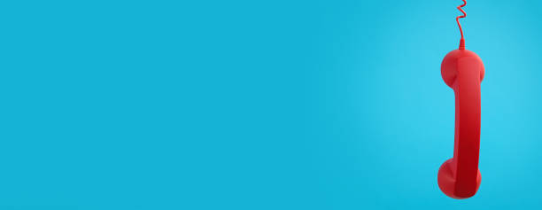 istock Hotline service. Red telephone receiver and space for text on light blue background, banner design 1391445831