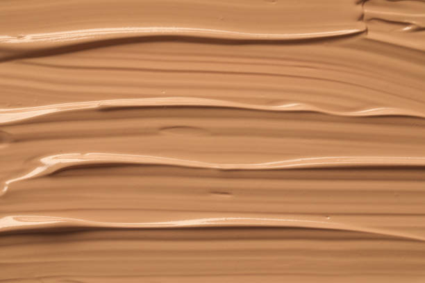 istock Texture of liquid skin foundation as background, closeup 1391445951