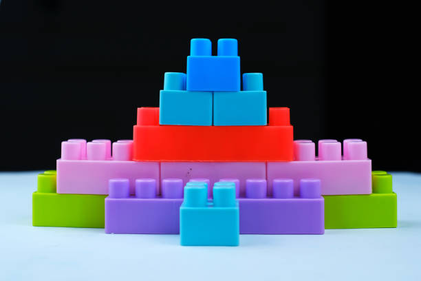 Children's toy plastic building blocks. Disassembly of children's toys