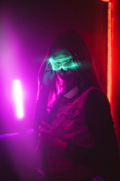 istock Futuristic woman with smart glasses and a gun 1391453452