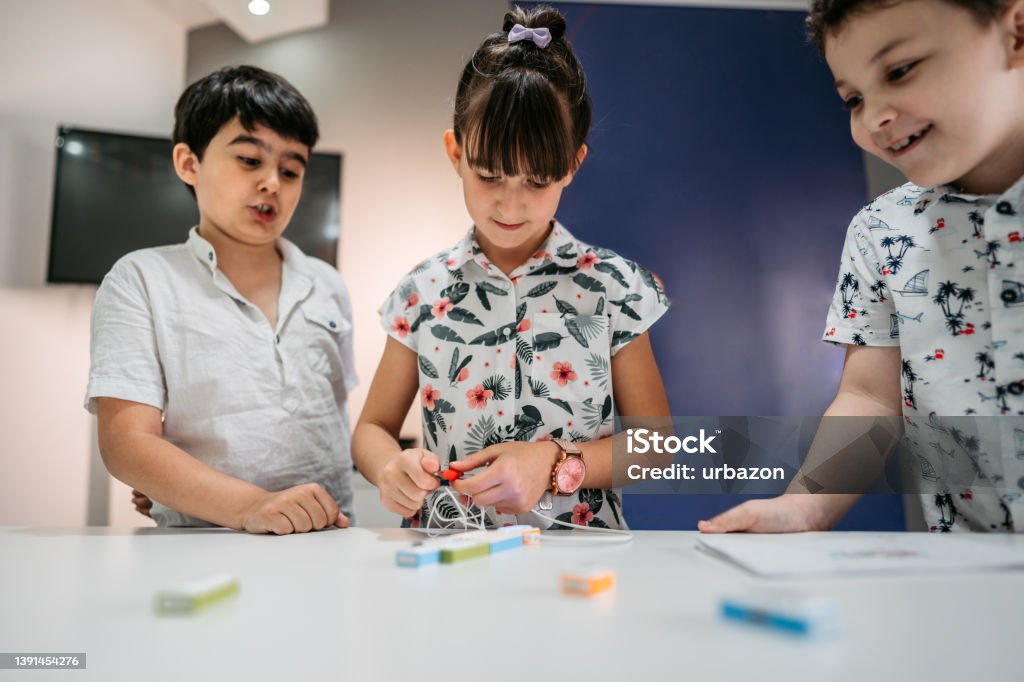 Elementary School Children Learning Programing Basics With Coding ...