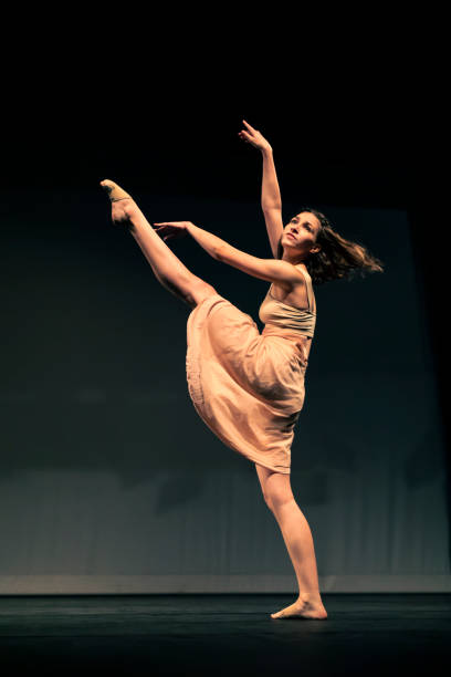istock Young girl dancing Contemporary Dance on stage 1391456074