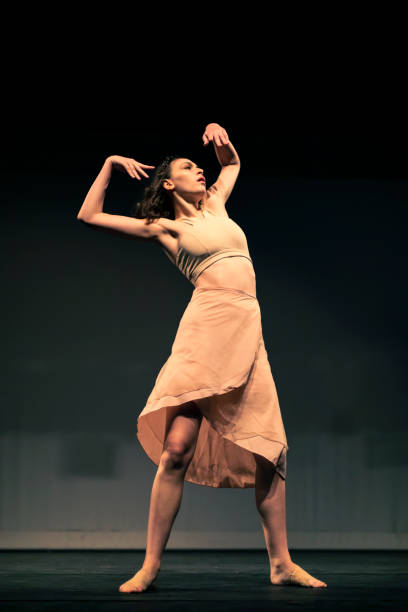 istock Young girl dancing Contemporary Dance on stage 1391456622