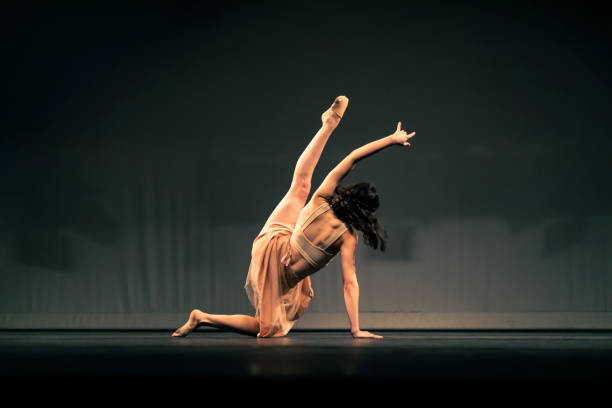 istock Young girl dancing Contemporary Dance on stage 1391456675