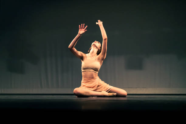 istock Young girl dancing Contemporary Dance on stage 1391456678