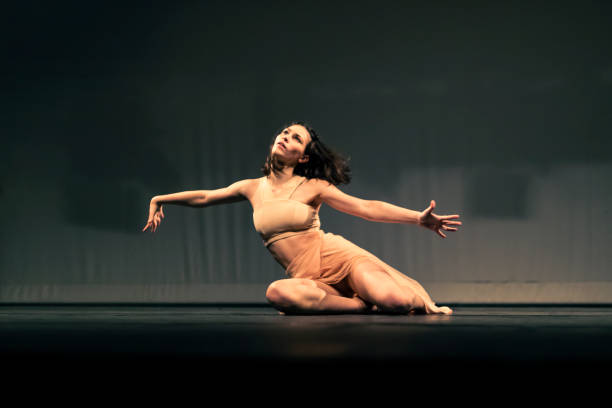 istock Young girl dancing Contemporary Dance on stage 1391456707