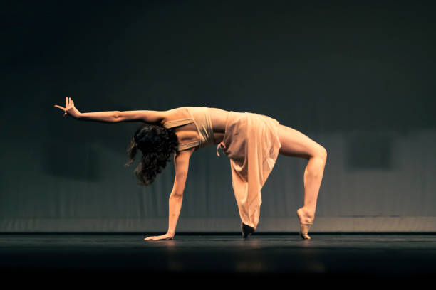 istock Young girl dancing Contemporary Dance on stage 1391456743