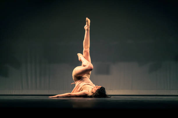 istock Young girl dancing Contemporary Dance on stage 1391456758