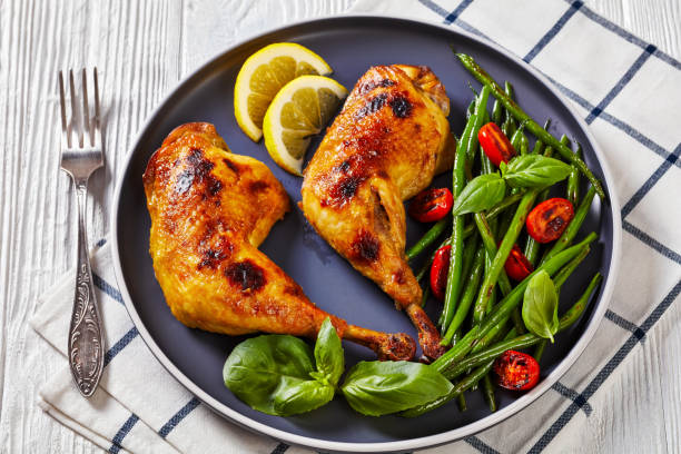 istock juicy roast chicken legs with green beans salad 1391456814