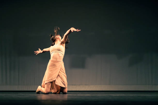 istock Young girl dancing Contemporary Dance on stage 1391456838