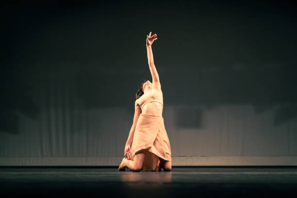 istock Young girl dancing Contemporary Dance on stage 1391456840
