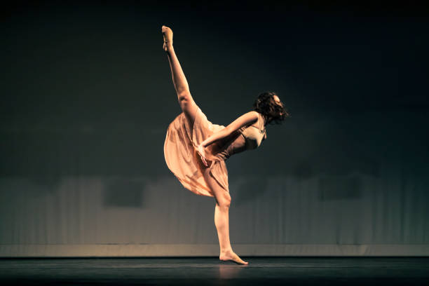 istock Young girl dancing Contemporary Dance on stage 1391456865