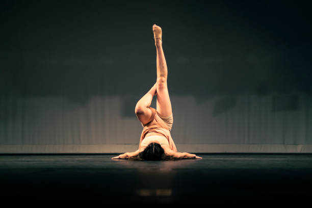 istock Young girl dancing Contemporary Dance on stage 1391456883