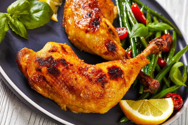 istock juicy roast chicken legs with green beans salad 1391456921