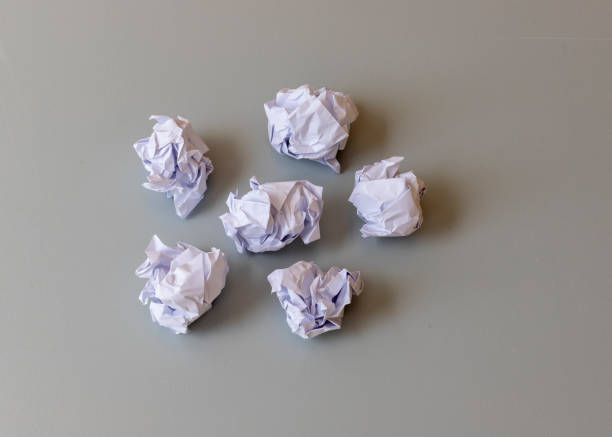 istock Crumpled paper balls high angle view 1391461450