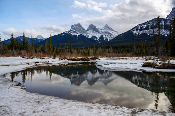 istock Three Sisters sunrise at Policeman Creek, Canmore, Alberta, Canadian Rockies, Canada 1391462425