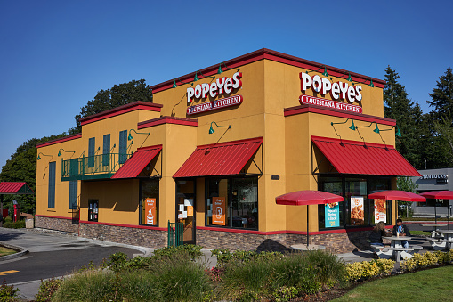 Portland, OR - Aug 13, 2020: A Popeyes restaurant in Portland, Oregon. Popeyes Louisiana Kitchen, Inc. is an American multinational chain of fried chicken fast food restaurants founded in New Orleans.