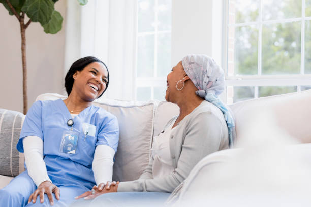istock Nurse and her cancer patient laugh 1391464002