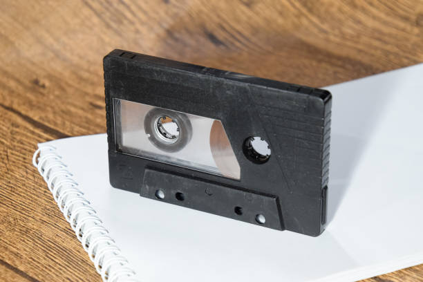 istock Audio cassette. Retro music medium, compact cassette tape recorder. 1391464636
